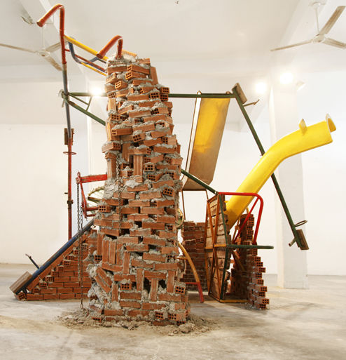 N.T.Y., 2012 Bricks, cement, discarded playground (swing, slides, merry-go-rounds, see-saws, climbing-bars) Height 4m, length 5.50, width 4m